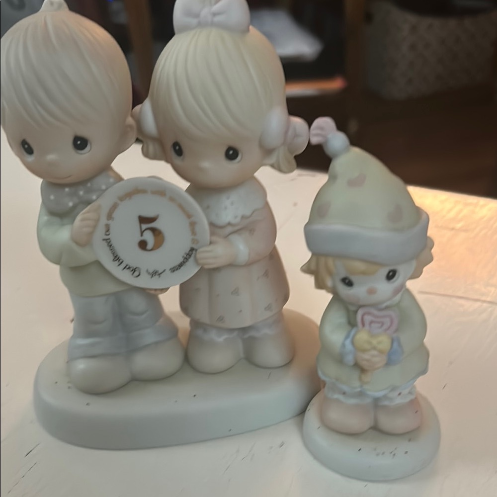 Precious Moments Cream and White Figurine Set